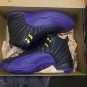 These are the Jordan’s purple and black 12’s